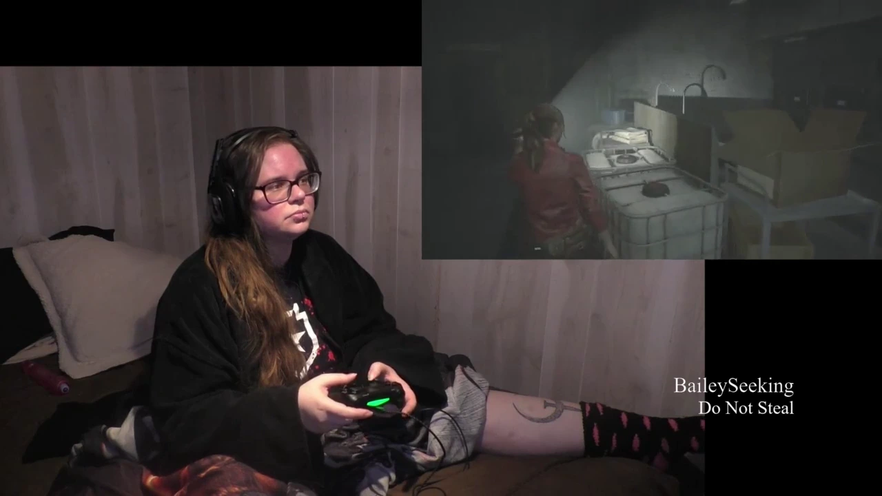 In this online porn video, a sexy gamer strips down to her lingerie while playing Resident Evil 2. The camera zooms in on her curves as she moves, giving viewers a close-up view of her every move.